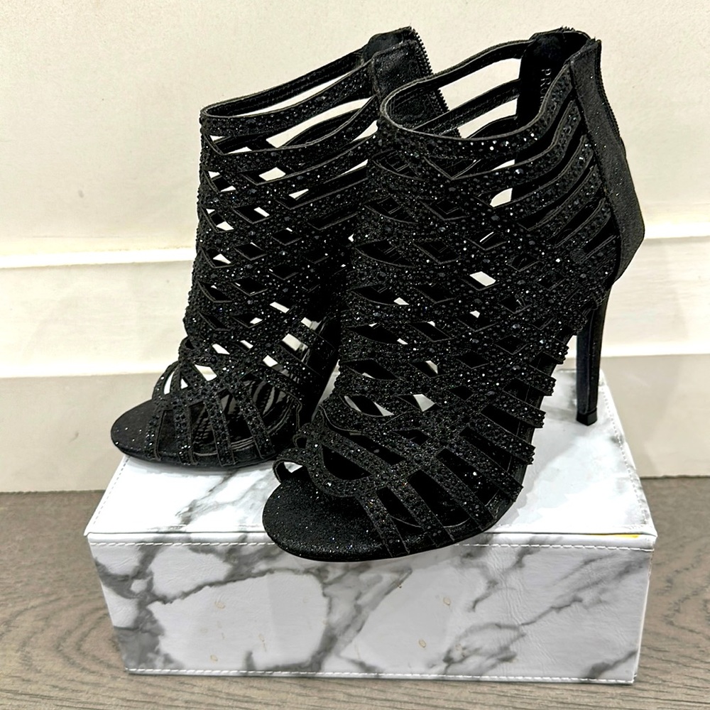 Dazzling black rhinestone cage booties.